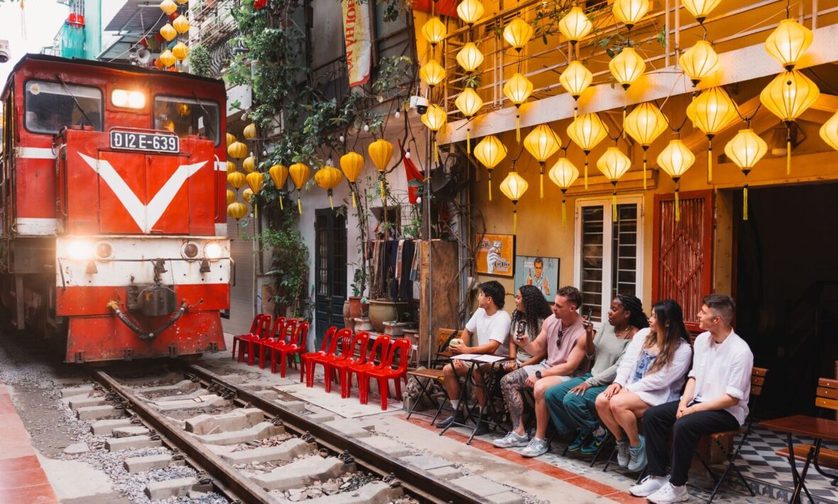 train passing through streets in Vietnam