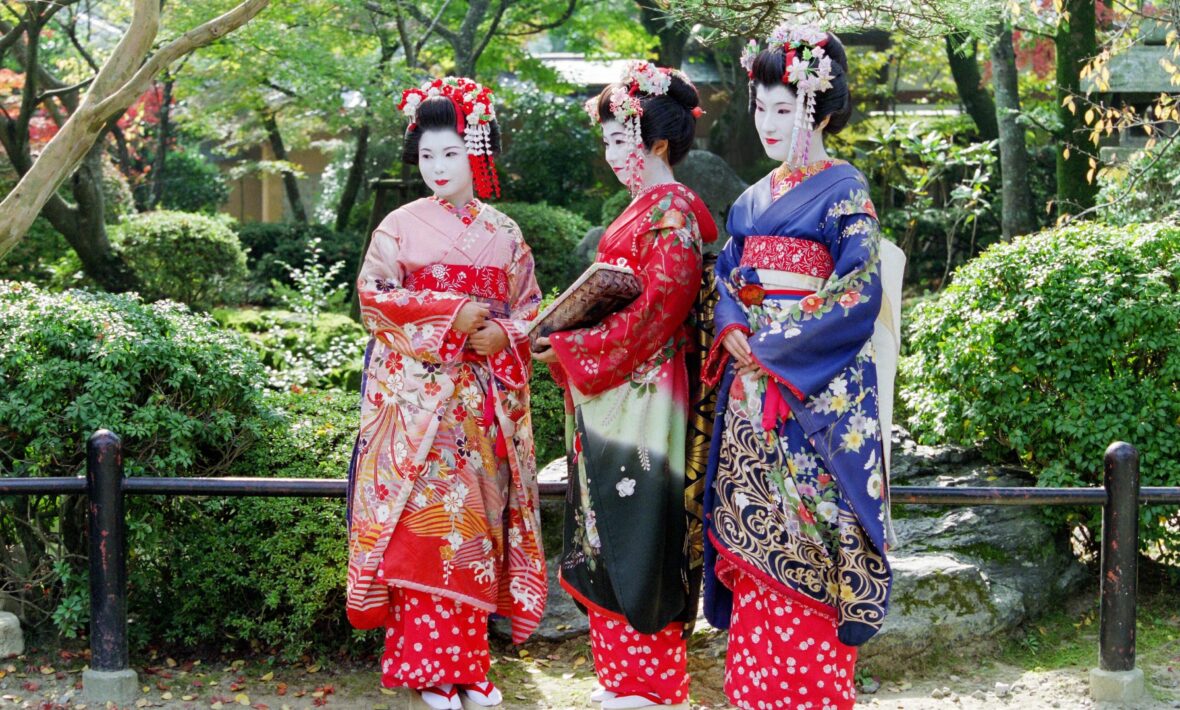 geishas in Japan dressed in their ornate kimonos