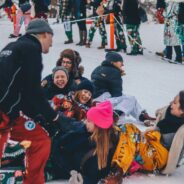 people laughing together in snow in Finland