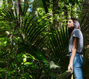 Girl-surrounded-by-fauna-in-New-Zealand