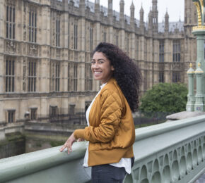 Girl-standing-on-westminster-bridge