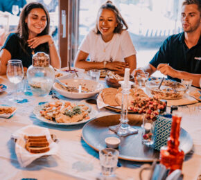 Friends eating together, Portugal