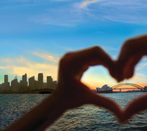 Sydney harbour bridge and sydney city skyline forming a heart on Anzac Day.