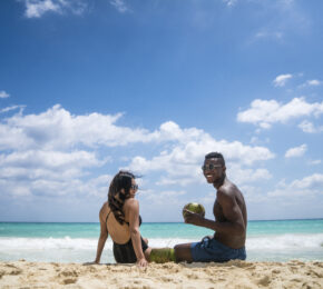 Eating coconuts on the beach