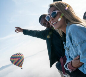 Hot air balloon ride over Cappadocia showcasing other cultures.