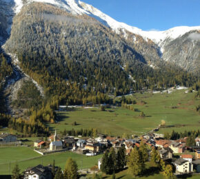 An Instagrammable aerial view of a village in the mountains.