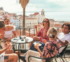 Group of friends eating in Portugal