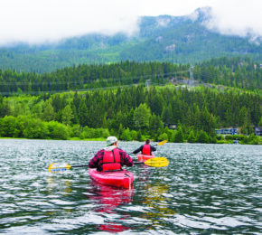 kayaking on lake in canada