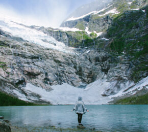 Figure in front of glacier