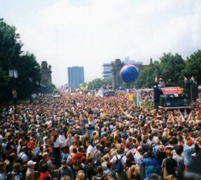 A large crowd of people on a street.