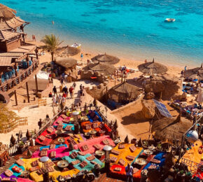 travelers relaxing on the beach in Sharm El-Sheikh