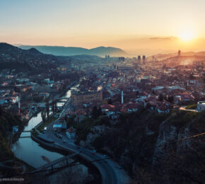 The sun is setting over Sarajevo.