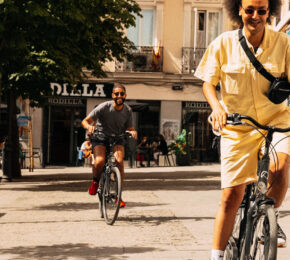 Travellers cycling in Madrid