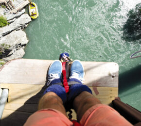 adventure travel - image taken looking down at feet about to bungee jump