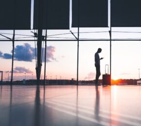 Man waiting for airplane at airport