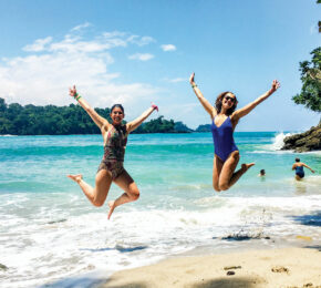 girls on beach in costa rica