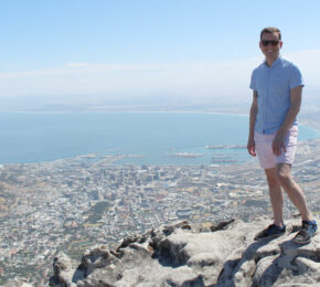 Ian Kivell standing on Table Mountain in Cape Town, South Africa