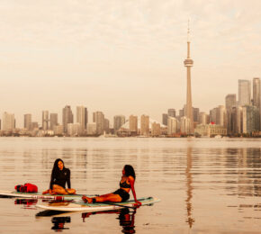 Best things to do in Toronto - girls paddle boarding