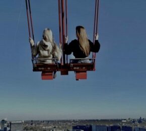 Megan and her friend at the ADAM Tower swing in Amsterdam