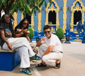 Contiki travellers at a temple in Thailand