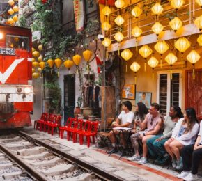 train passing through streets in Vietnam