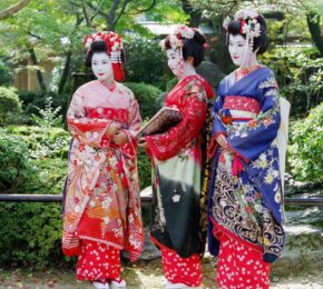 geishas in Japan dressed in their ornate kimonos