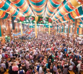 Crowds gathering in Schützen Festzelt at Oktoberfest in Munich