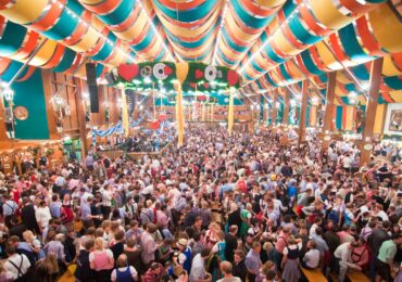 Crowds gathering in Schützen Festzelt at Oktoberfest in Munich