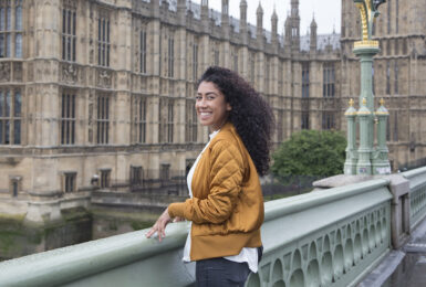 Girl-standing-on-westminster-bridge