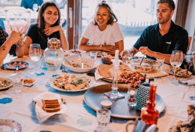 Friends eating together, Portugal