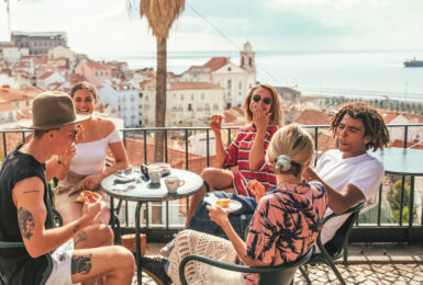 Group of friends eating in Portugal