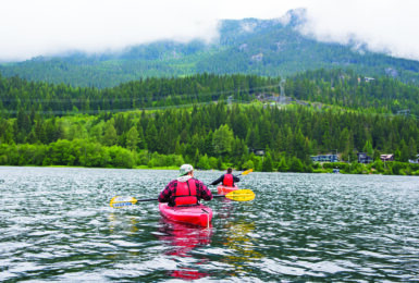 kayaking on lake in canada