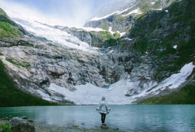 Figure in front of glacier