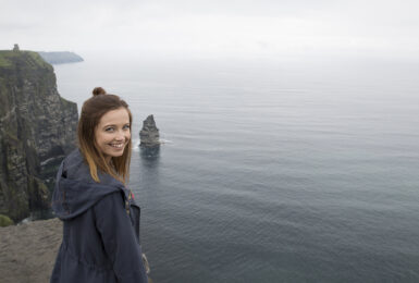 Girl-on-Galway-cliff-Ireland-solo