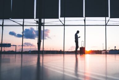 Man waiting for airplane at airport