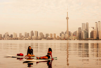 Best things to do in Toronto - girls paddle boarding