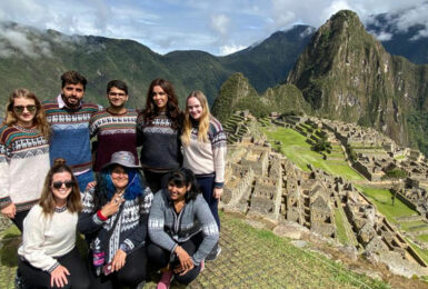 Group of friends on Peru Panorama at Machu Picchu