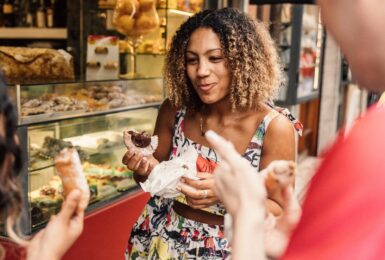 travellers eating Italian food
