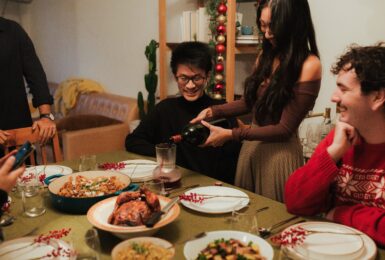 friends enjoying Thanksgiving feast together