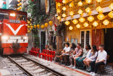 train passing through streets in Vietnam