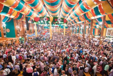 Crowds gathering in Schützen Festzelt at Oktoberfest in Munich