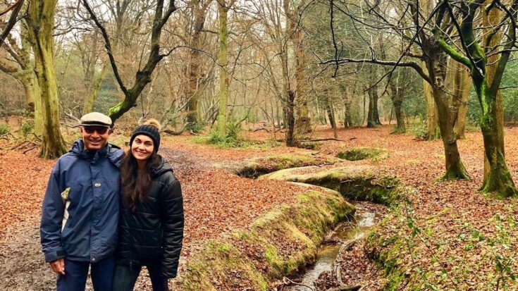 Gaby and her dad walking in the countryside