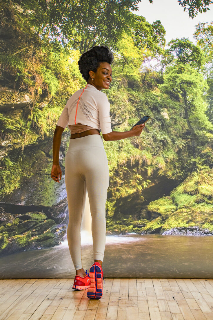 Young woman with Tollymore Forest Park in Northern Ireland as the background.