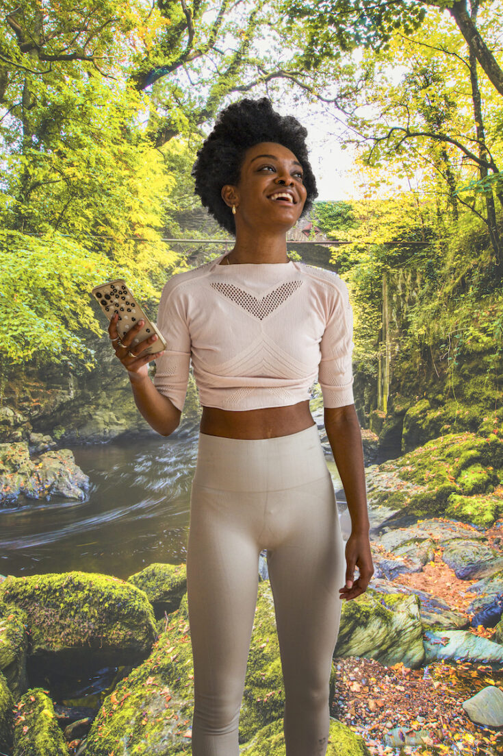 Young woman with Tollymore Forest Park in Northern Ireland as the background.