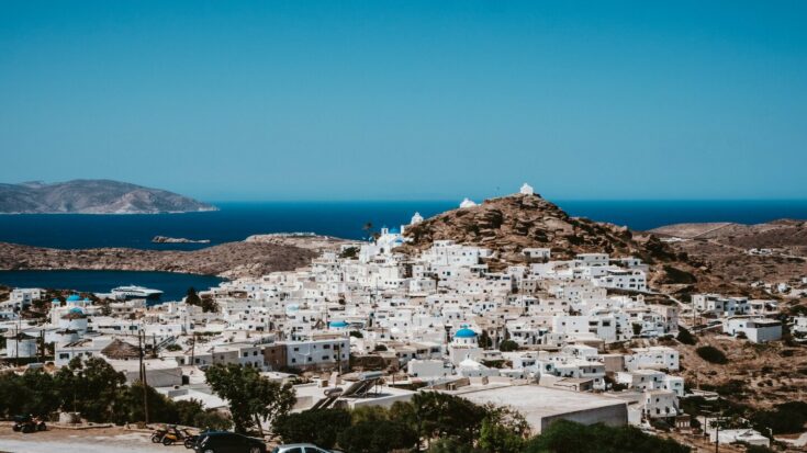 white and brown houses in ios, greece