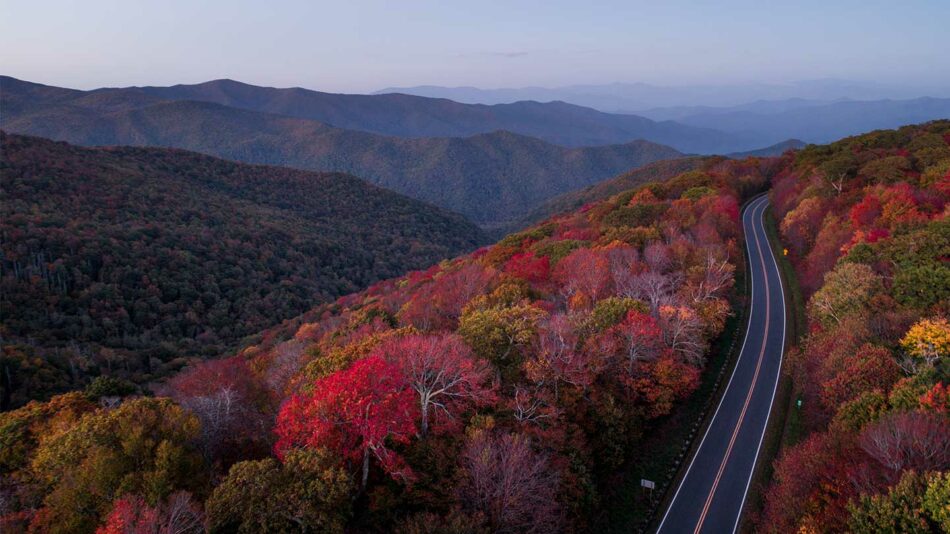 An aerial view of a road in the great Smoky Mountains, one of the 15 best places to visit in October.