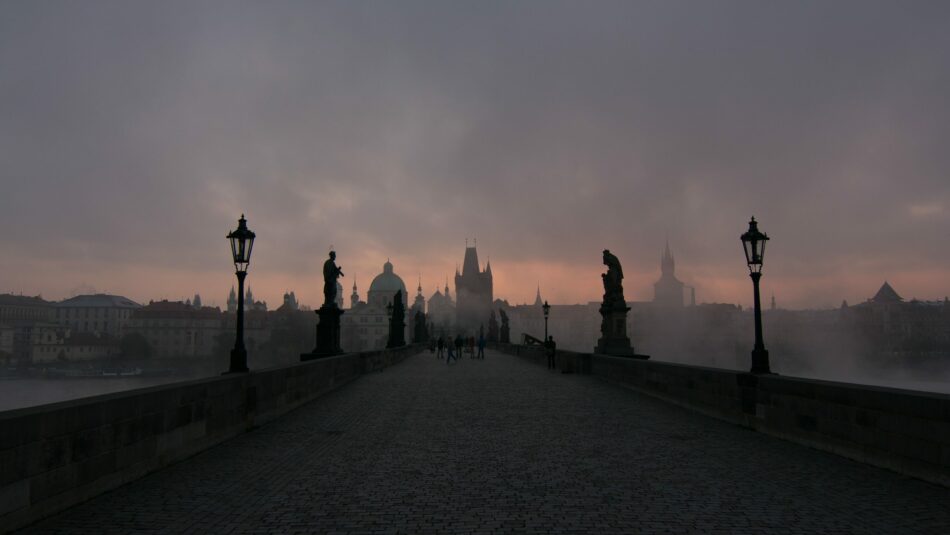 ghostly looking bridge in Prague at dusk