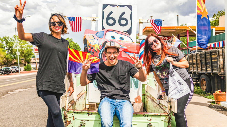 Group of Contiki travellers on Route 66 in USA