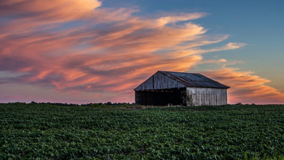 a barn in Indiana with sunset skies