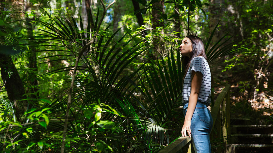 Girl-surrounded-by-fauna-in-New-Zealand